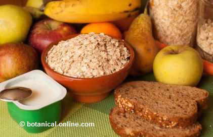 Photo: composition with oats with yogurt, whole wheat bread and fruit