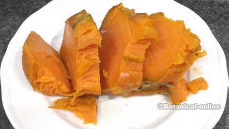 of sweet potato that has been cooled, sliced and reheated, ready for a healthy breakfast