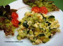 Scrambled eggs with zucchini and onions