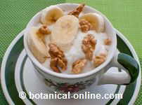 Photo of yogurt with nuts and banana